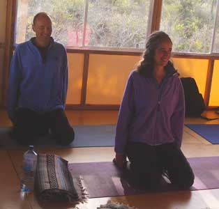 Happy yoga students virasana pose